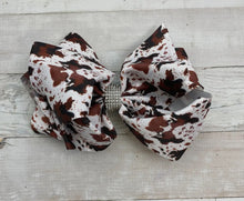 Load image into Gallery viewer, Brown Cowhide Rhinestone Center Bow